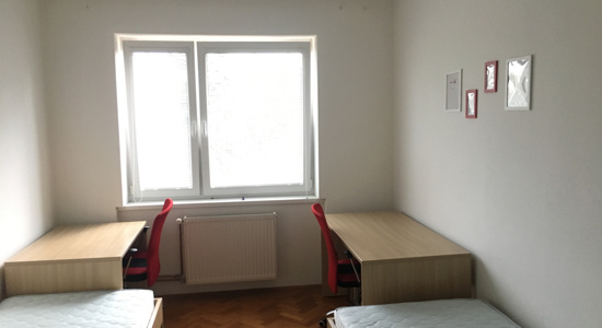 Ležišče v dvoposteljni sobi